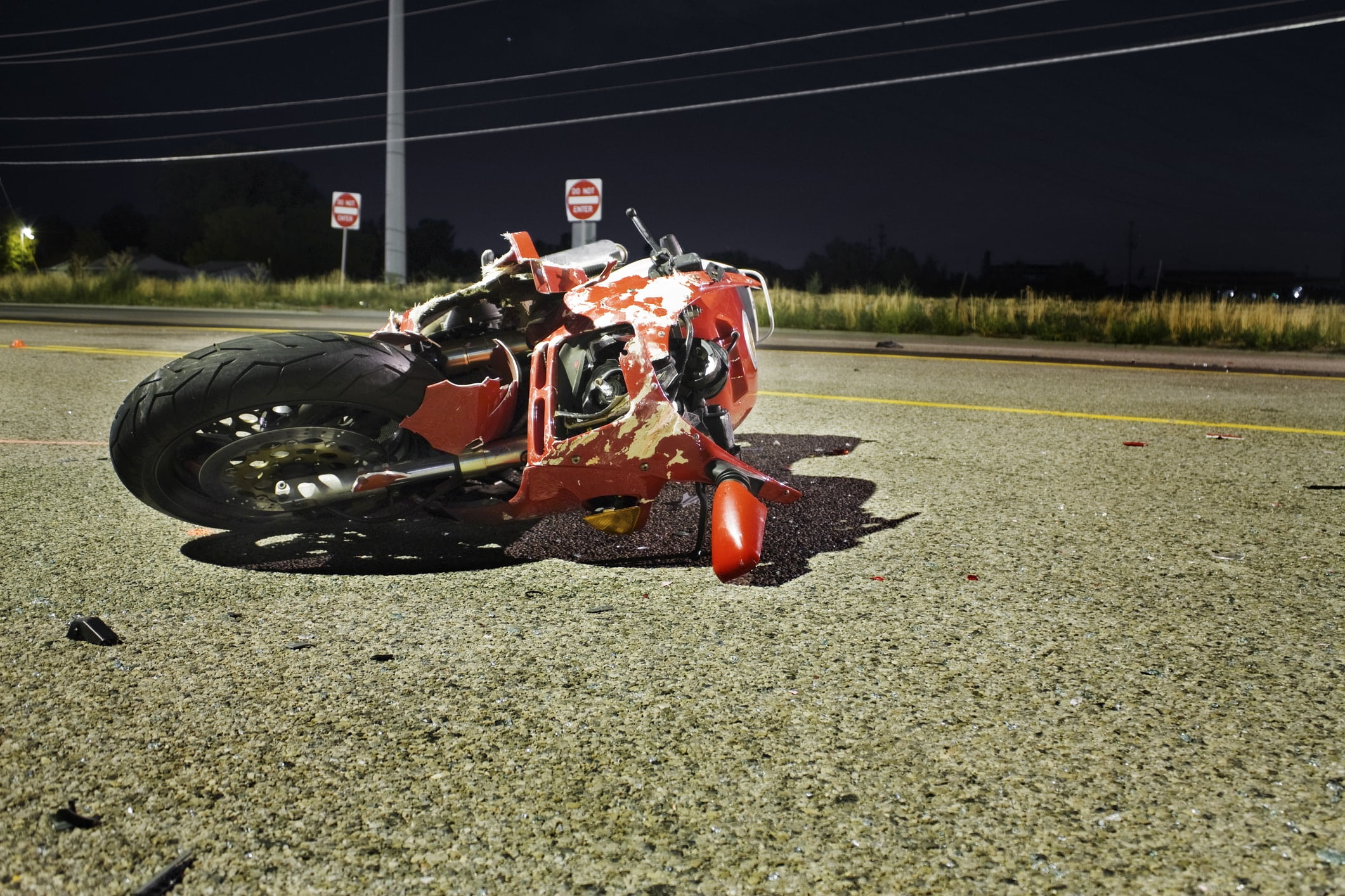 The scene of a motorcycle accident on the road